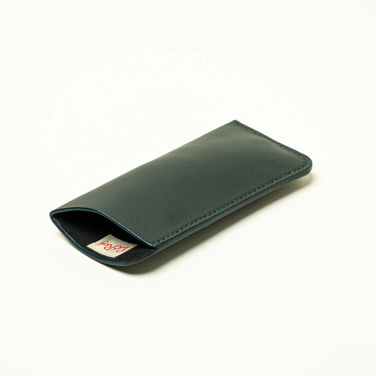 Horus glasses sleeve in dark green leather with Alcantara lining, closed, L'officina di LeRoy, made in LA