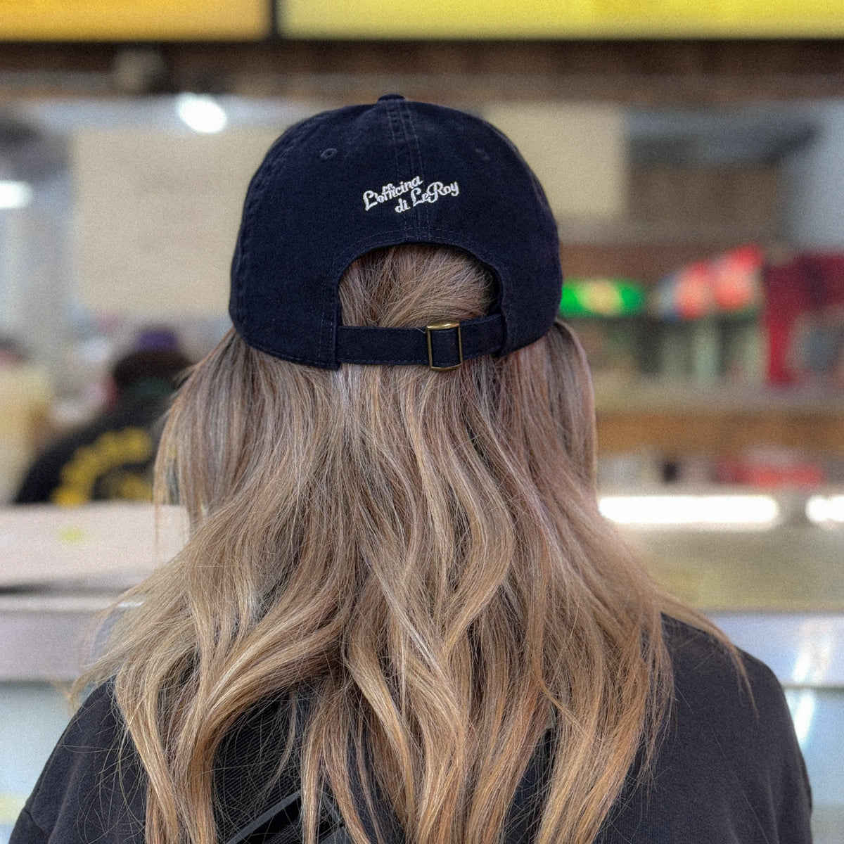 LeRoy's Chop Shop cap lifestyle shot outdoors