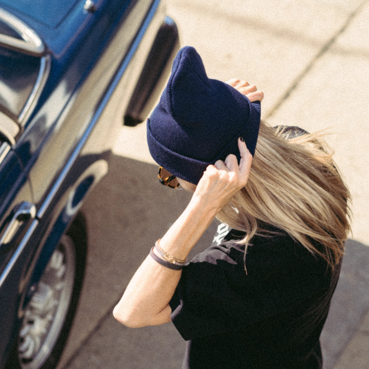 LeRoy dark navy beanie flat lay on a light background