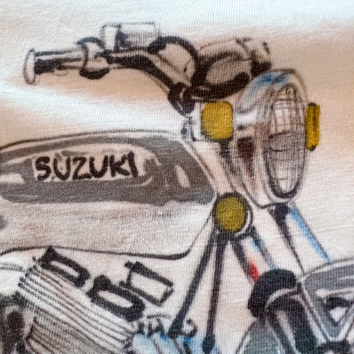 Vintage Suzuki raglan tee collar and sleeve join detail