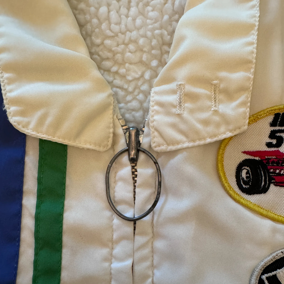 Vintage Indy 500 jacket collar and stripe detail