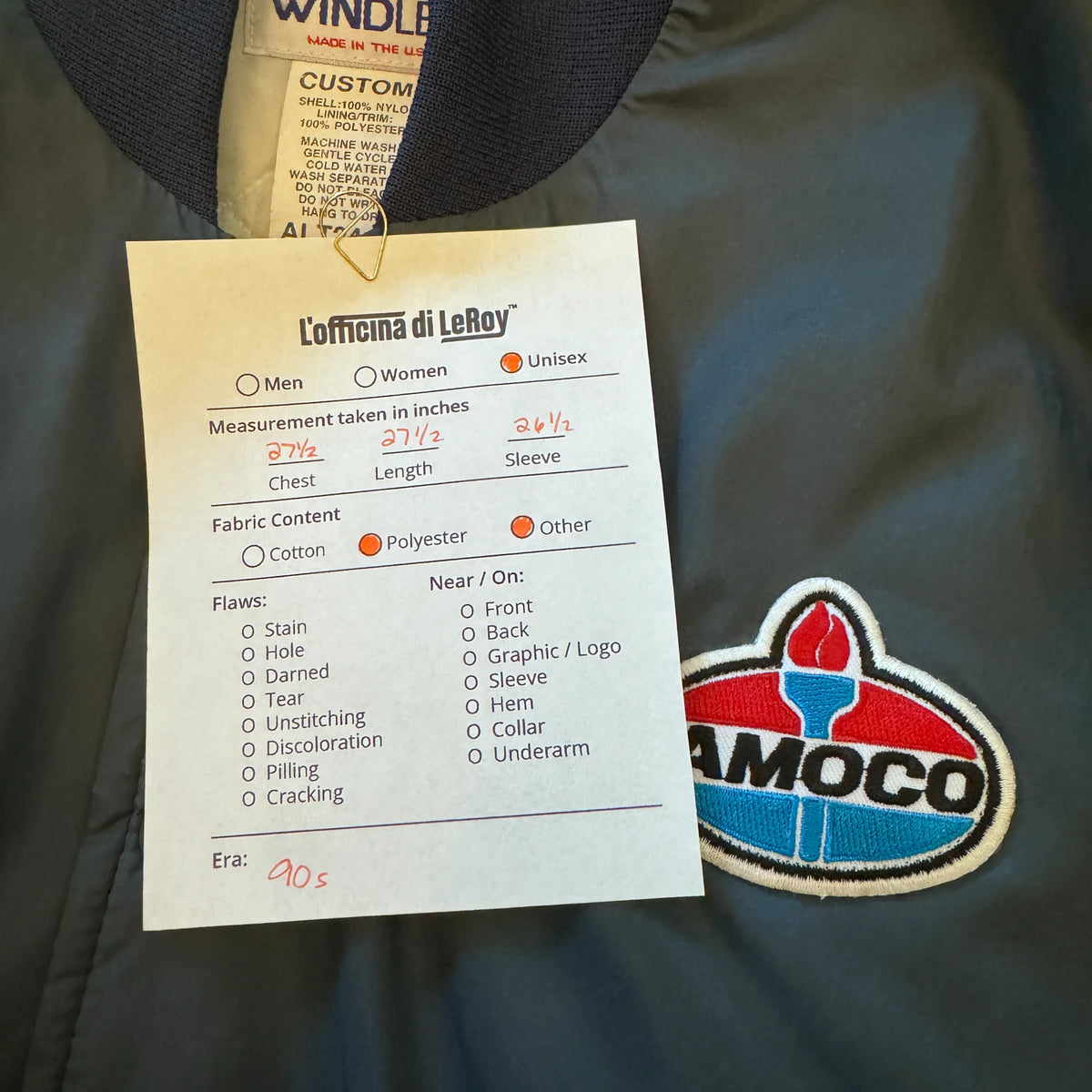 Vintage Amoco bomber interior lining and tag detail