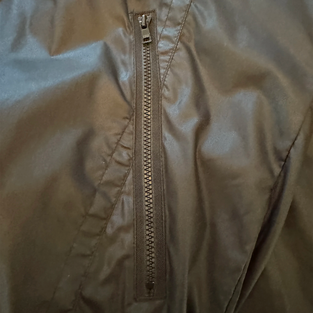Vintage Castrol GTX jacket side view showing silhouette