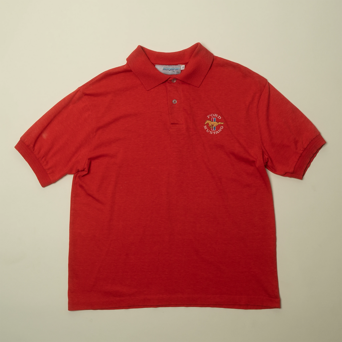Vintage Ford Motorsport polo in red with embroidered Mustang logo on chest, large