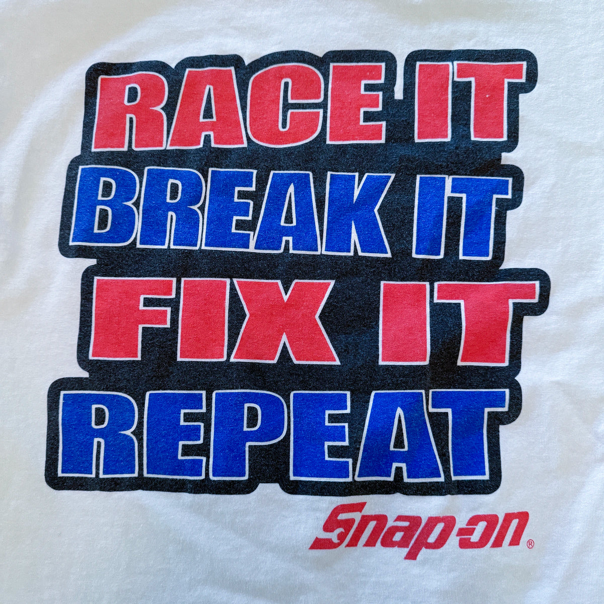 Vintage Snap-on tee side view showing fit and fabric