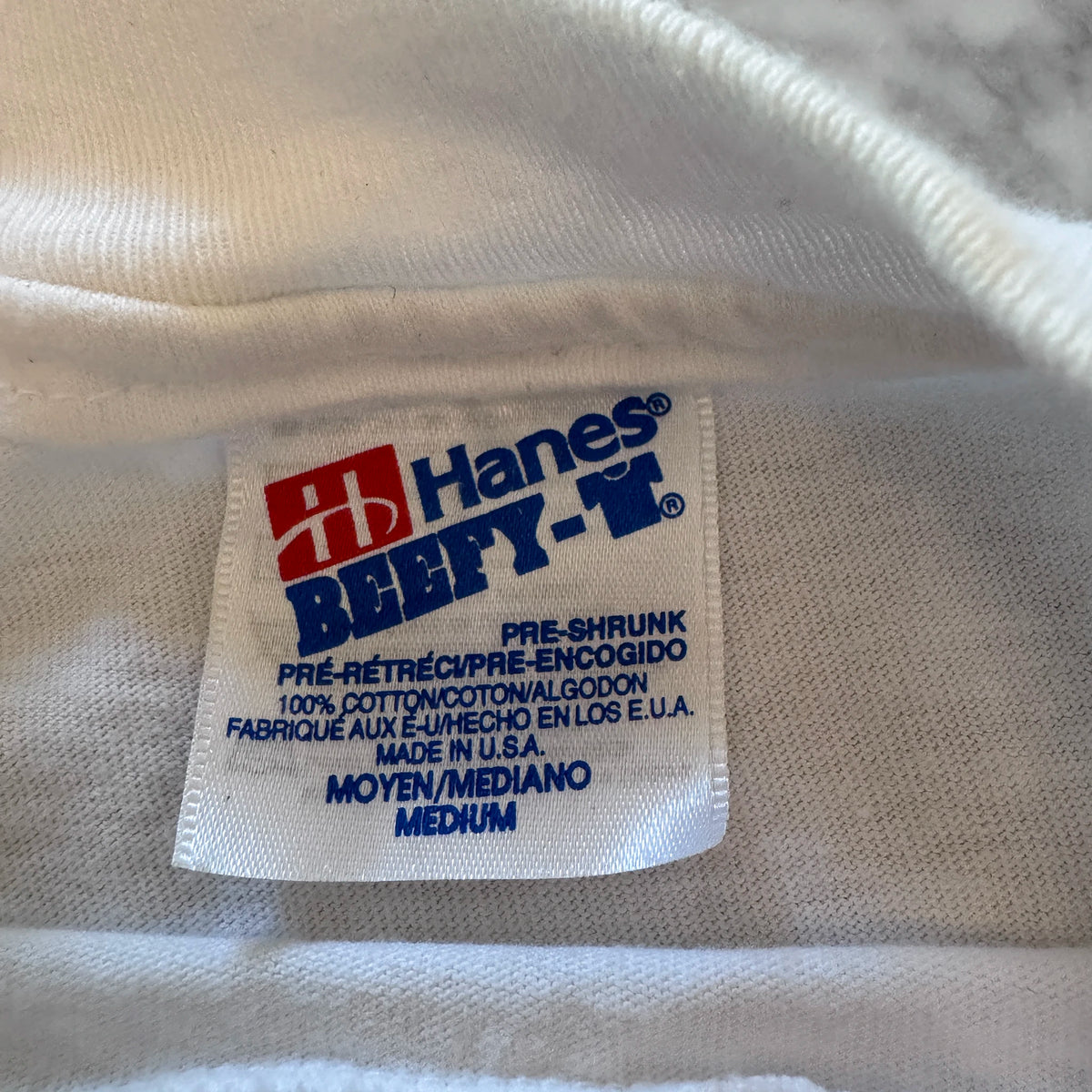 Vintage Leroys Boys tee laid flat showing collar and sleeve detail