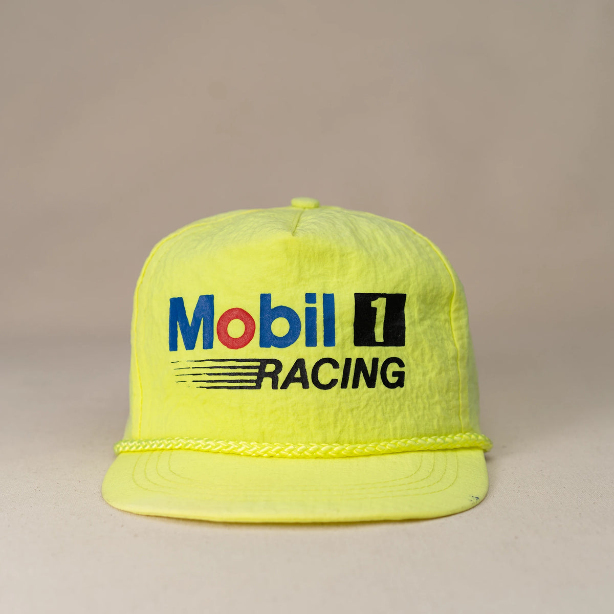 Vintage Mobil 1 Racing snapback hat in yellow with blue and black logo and braided brim rope