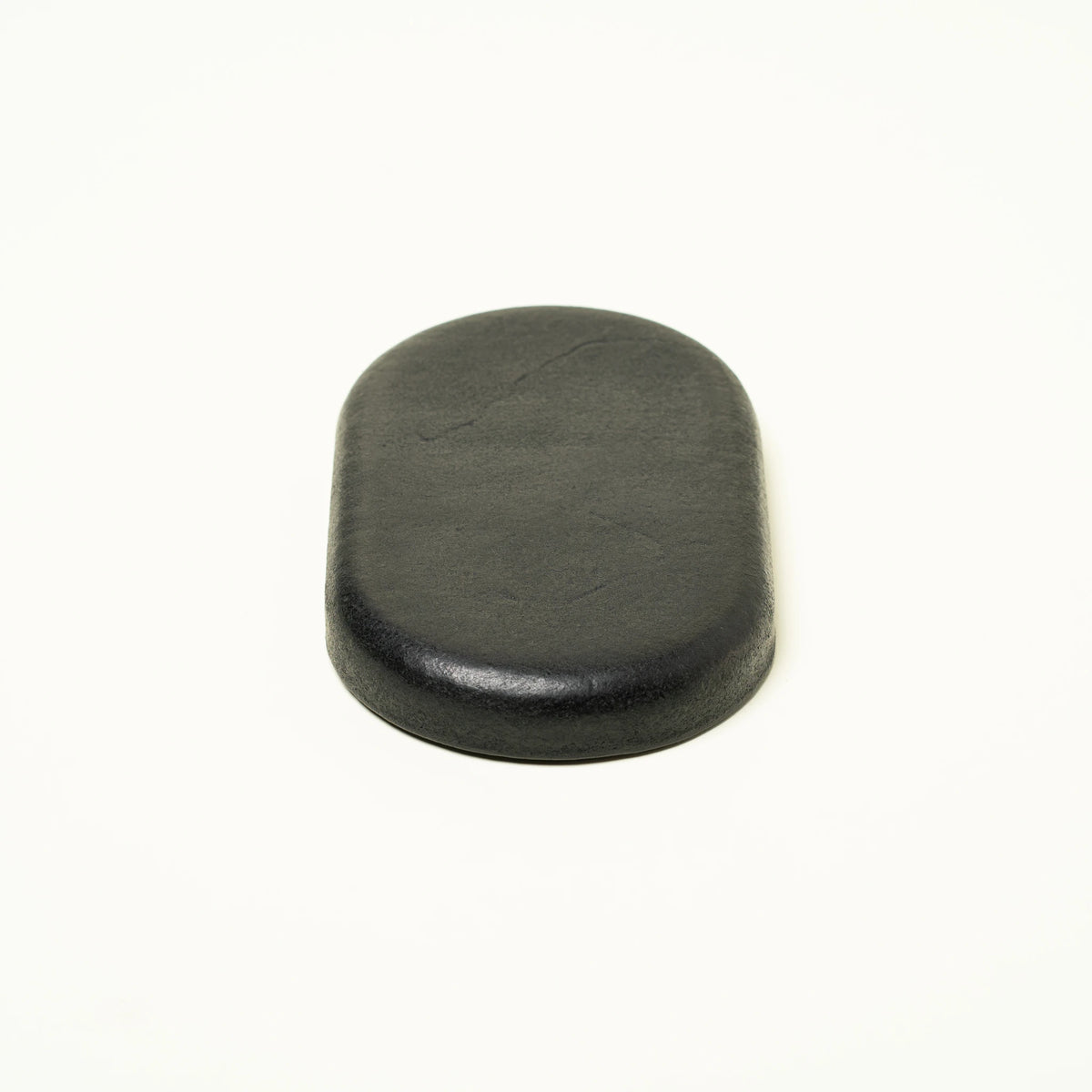 Vessel leather valet tray showing underside and base