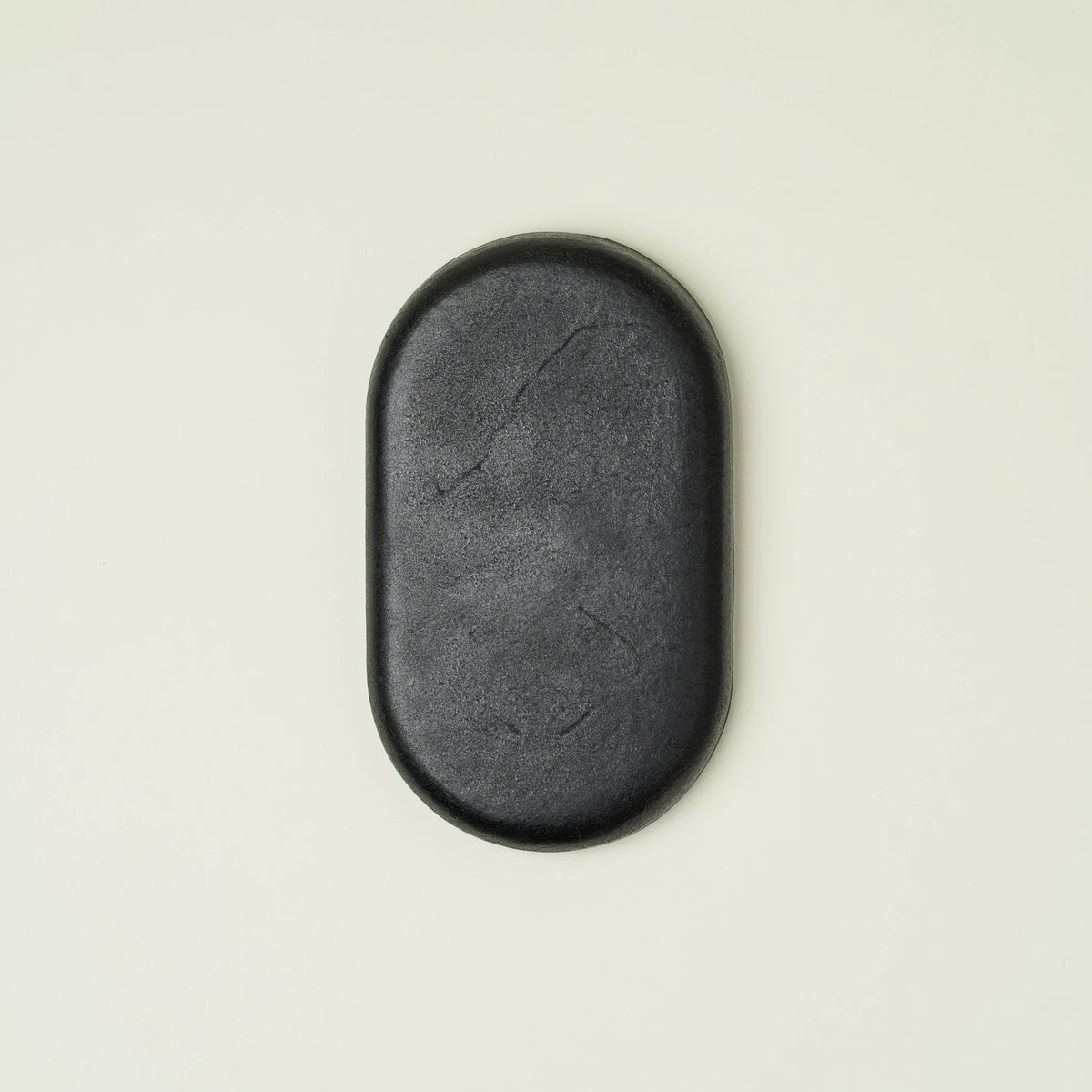 Vessel valet tray close-up of interior surface and leather finish