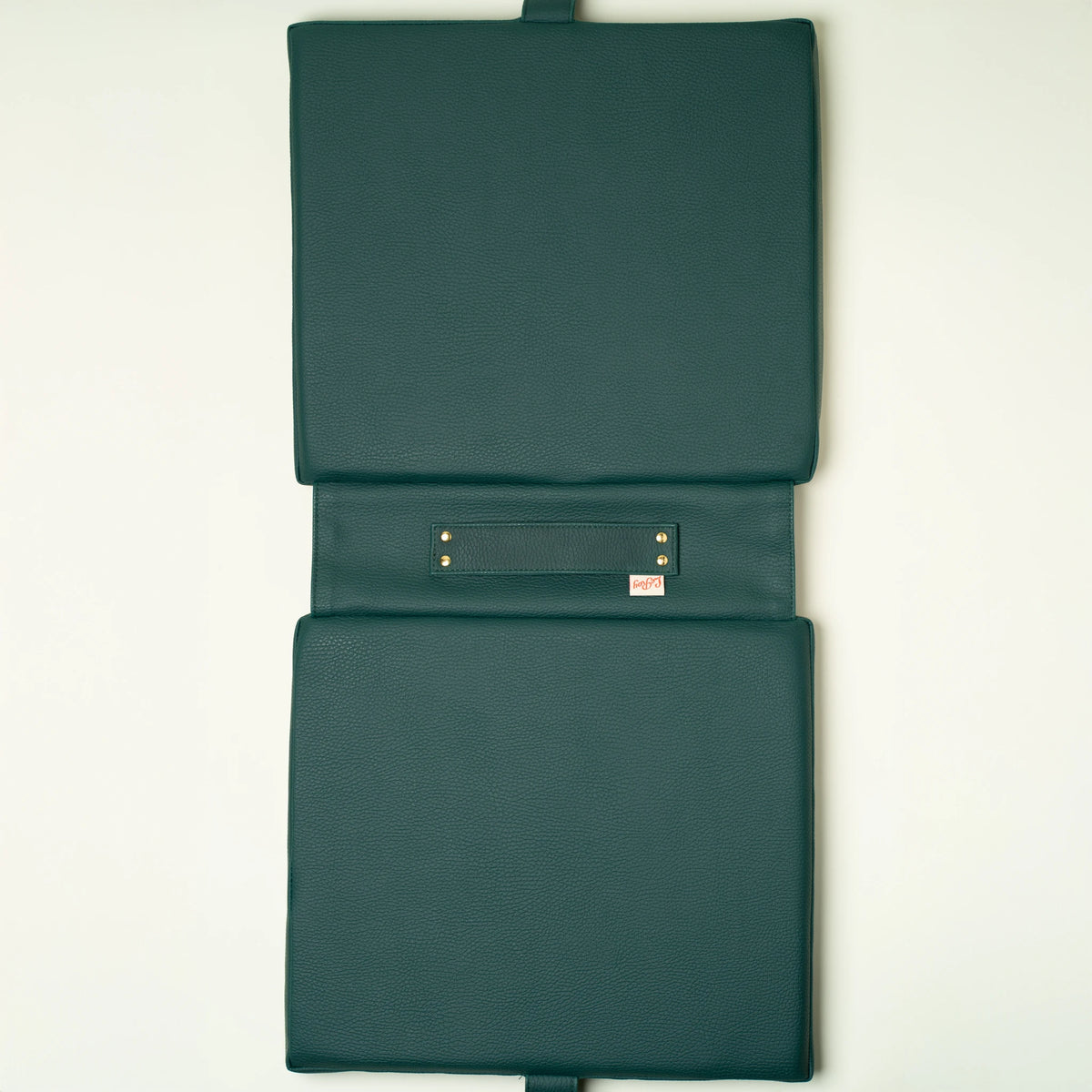 Pepita tailgate cushion angled view showing thickness and construction