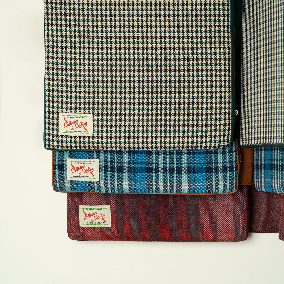 Full lineup of L'officina di LeRoy tailgate cushions on beige