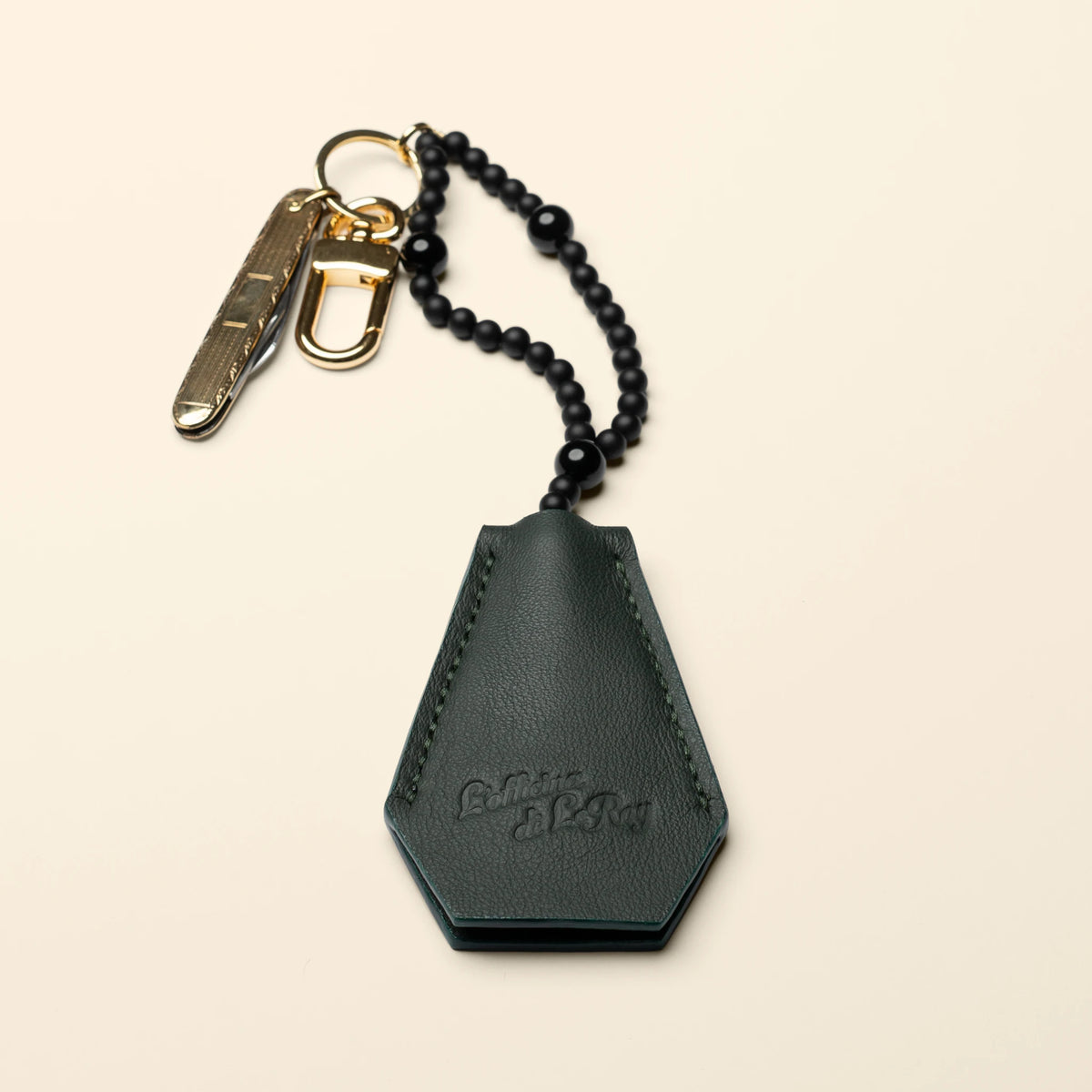 Key Coffin leather key fob top-down view showing shape and hardware