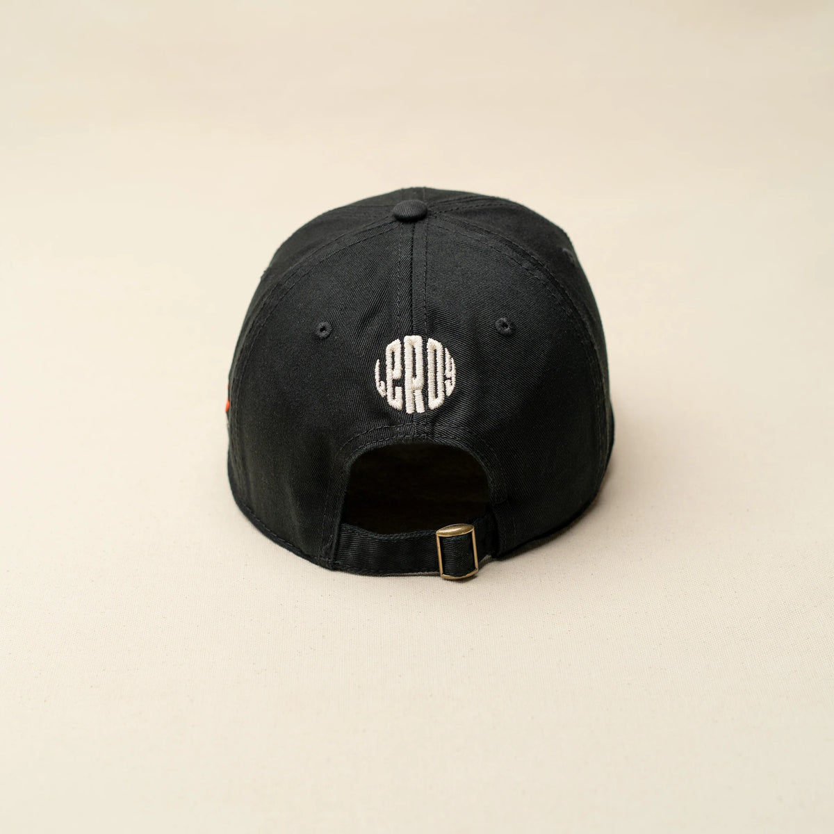 Back of As Above So Below black cap showing logo detail