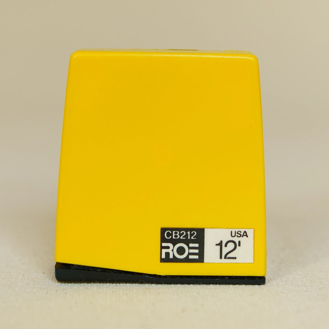 Vintage dead-stock Roe 12-foot tape measure, USA-made, yellow case with black base