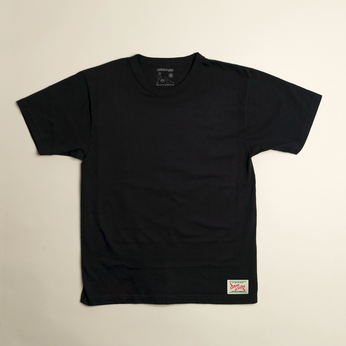 Ecru Label heavyweight tee in black with woven LeRoy label at hem, L'officina di LeRoy
