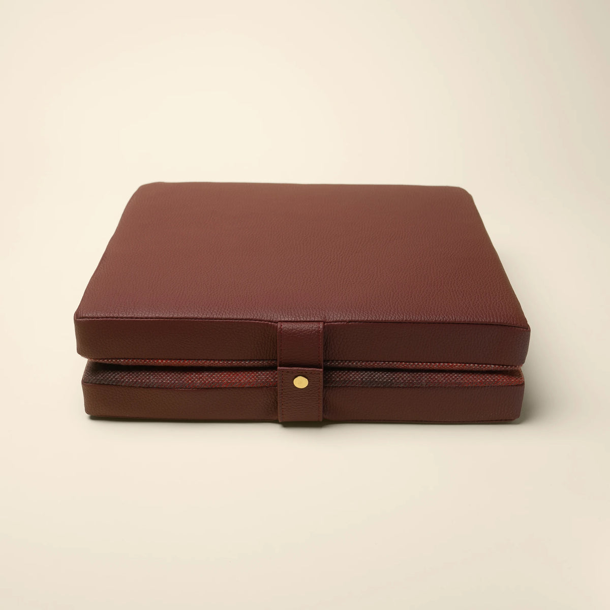 Studio Check tailgate cushion top-down view on a beige background