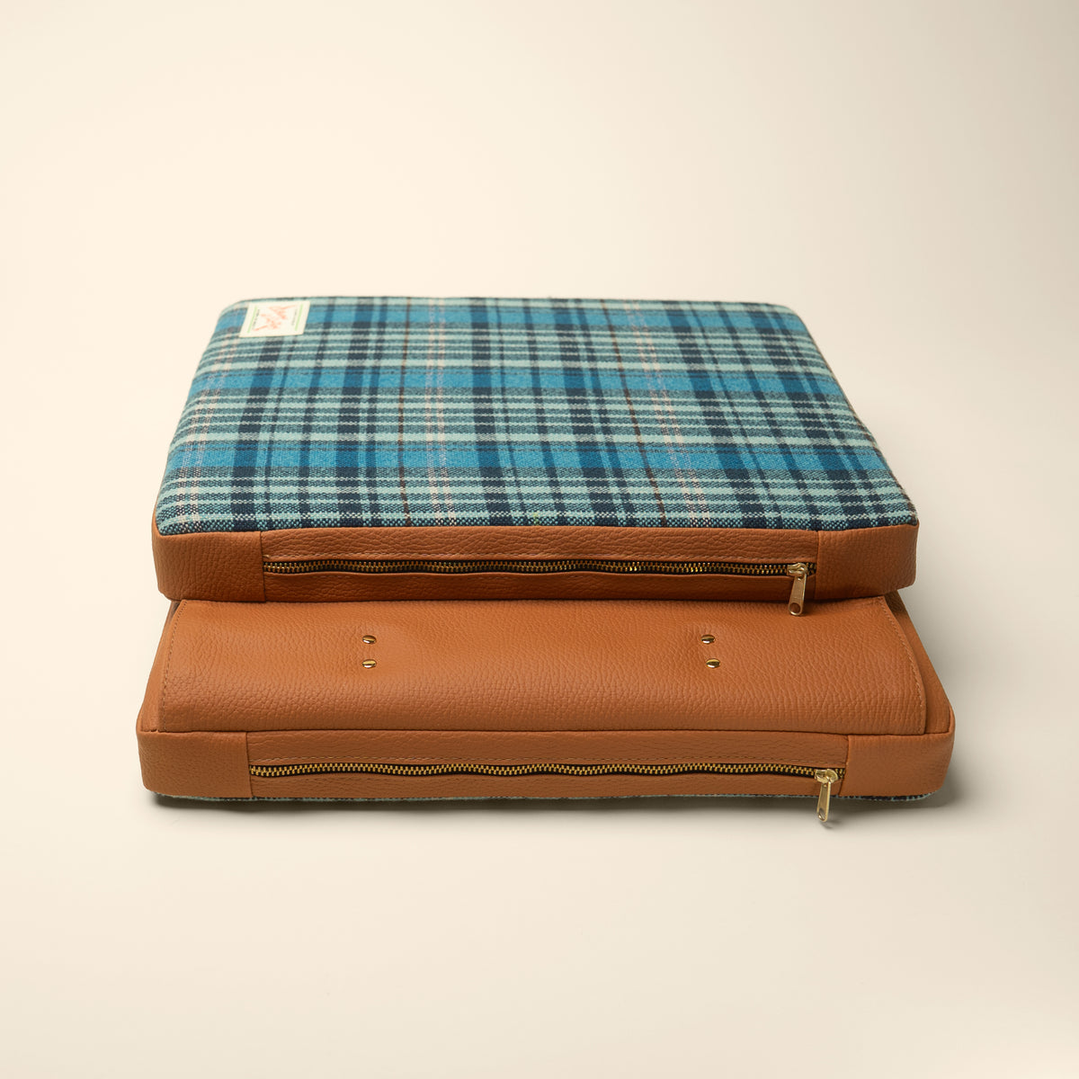 Tartan tailgate cushion flat lay showing full face