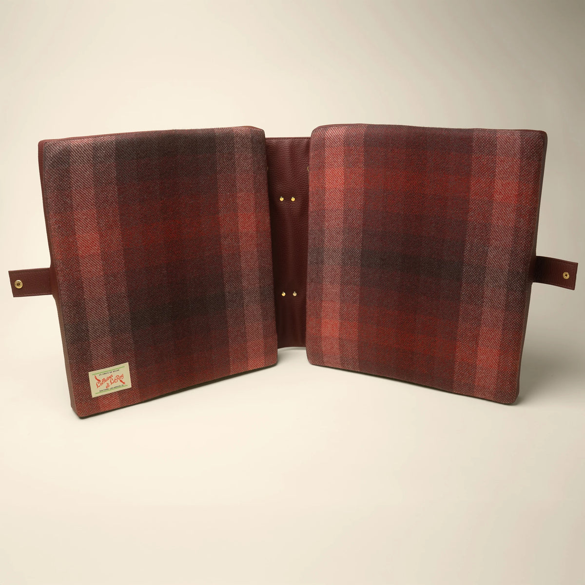 Studio Check tailgate cushion side view on a beige background